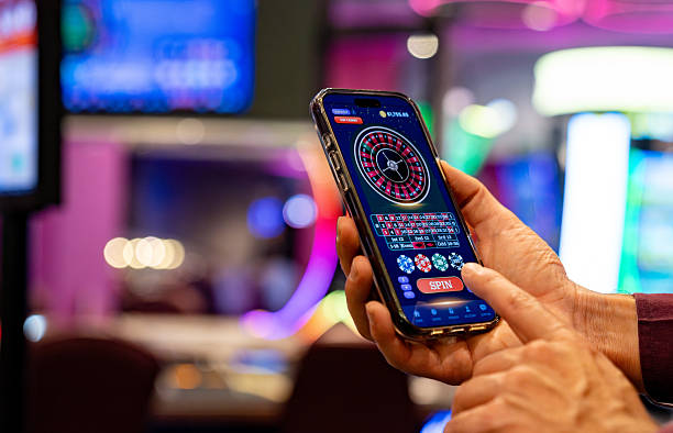 Multi-camera live studio setup showing dealer, wheel, and betting interface